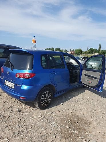 Mazda Demio: 2003 г., 1.3 л, Автомат, Бензин
