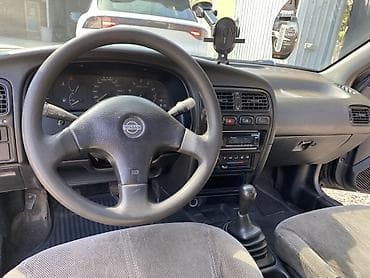 devo tiko: Nissan Primera: 1992 г., 1.6 л, Механика, Бензин, Седан — 6