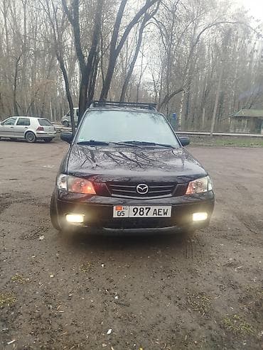 Mazda Demio: 2002 г., 1.5 л, Механика, Бензин, Хэтчбэк — 4