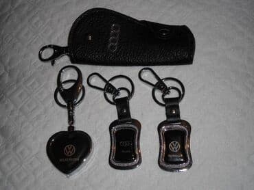 автомобильные аксессуары: 1. Верхний ряд мигающие AUDI=20 сом. Второй ряд NISSAN=50 сом — 6