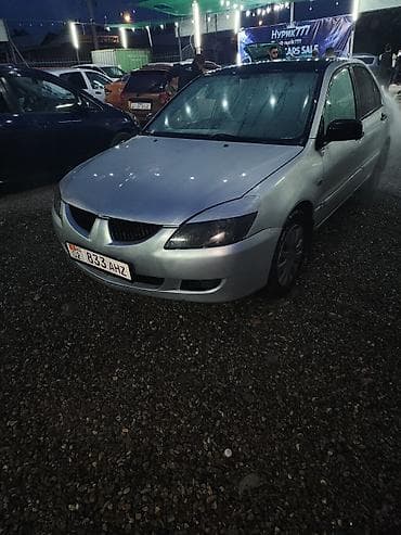 geely mongaro: Mitsubishi Lancer: 2005 г., Седан — 1
