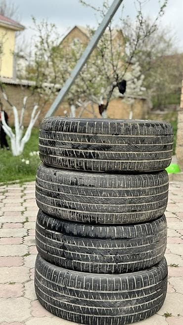 Комплект автомобильных шин – 4 шт. Размер: 235/55 R18 Индекс