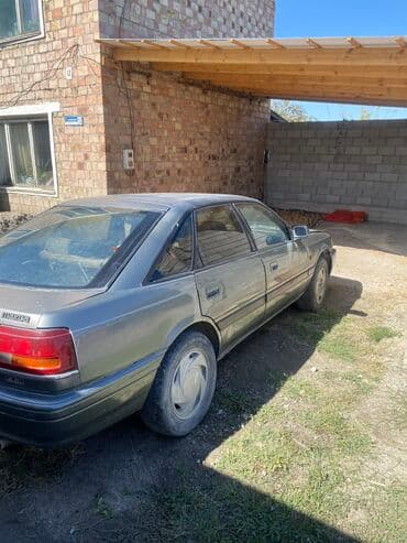 Mazda 626: 1990 г., 2.2 л, Механика, Бензин, Хетчбек — 2