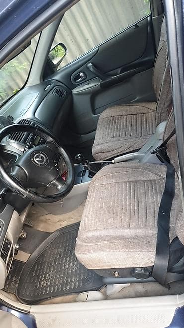 bl5 subaru: Mazda 323: 2003 г., Механика, Газ, Хэтчбэк — 4
