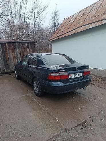 бак мазда демио: Mazda Capella: 1999 г., 1.8 л, Автомат, Бензин, Седан — 8