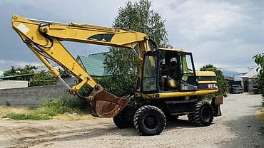 Экскаватор, Caterpillar, Дөңгөлөктүү
