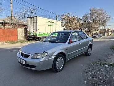 launch 431: Mazda 323: 2003 г., 1.6 л, Механика, Бензин, Седан — 2