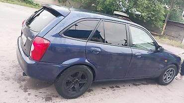 bl5 subaru: Mazda 323: 2003 г., Механика, Газ, Хэтчбэк — 1
