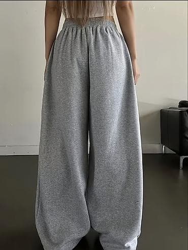 штаны килот: Свободные спортивные штаны унисекс в меланжево-сером цвете. - — 2