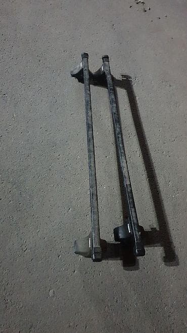 ролики на одиссей: Поперечные дуги На рейлинги Thule — 1