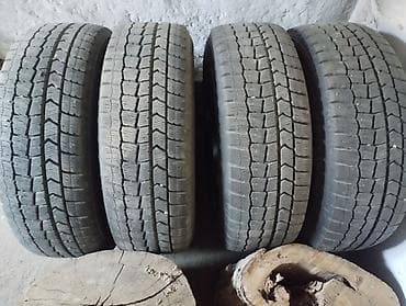 падиомник авто: Комплект зимних колёс на штампованных дисках. - Шины: Dunlop — 6