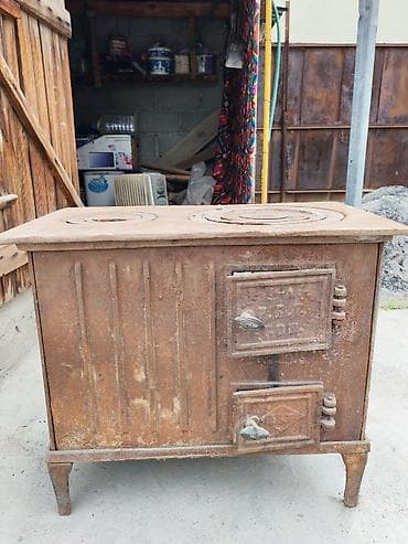 мока высокого давления: Чугунная дровяная плита-печь (буржуйка) с варочной поверхностью — 4