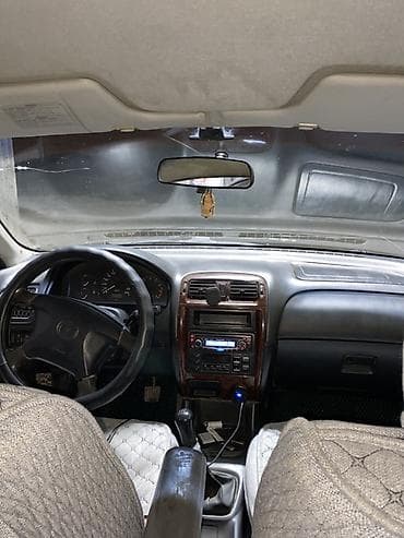 авто мотор: Mazda 626: 1999 г., Седан — 9