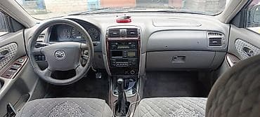 авто уналар: Mazda 626: 1999 г., 2 л, Кол менен иштөөчү, Бензин, Лифтбек — 5