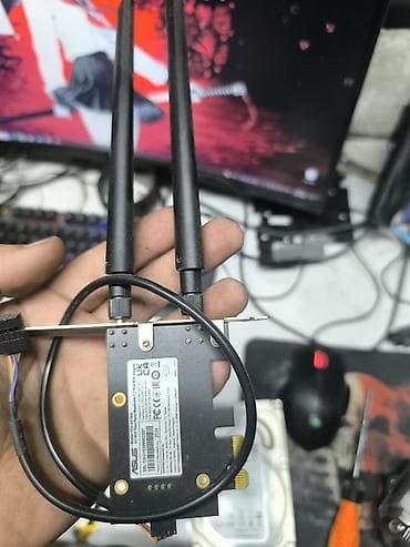 Модемы и сетевое оборудование: Wi‑Fi/Bluetooth адаптер ASUS PCIe - Форм‑фактор: плата расширения PCI — 1