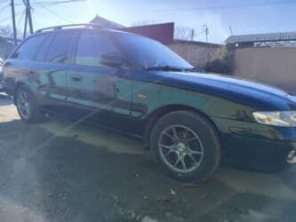 крыло мазда: Mazda 626: 2002 г., 2 л, Механика, Бензин, Универсал — 4