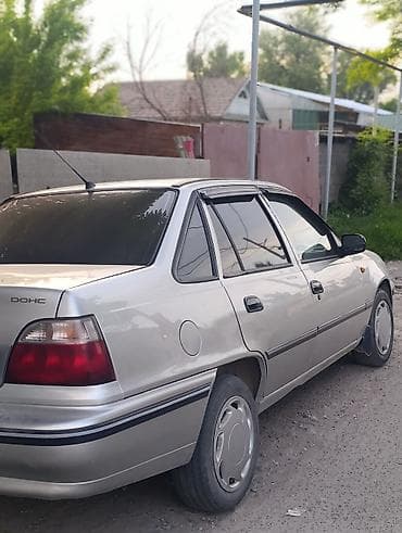Daewoo Nexia: 2007 г., Бензин, Седан — 4
