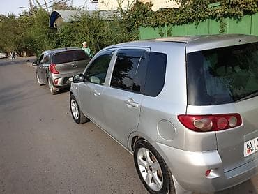 haima 3: Mazda Demio: 2003 г., Автомат, Бензин, Хэтчбэк — 1