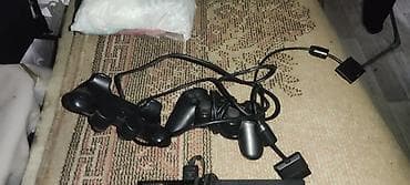 Проводной геймпад для PlayStation 2. - Классическая эргономичная