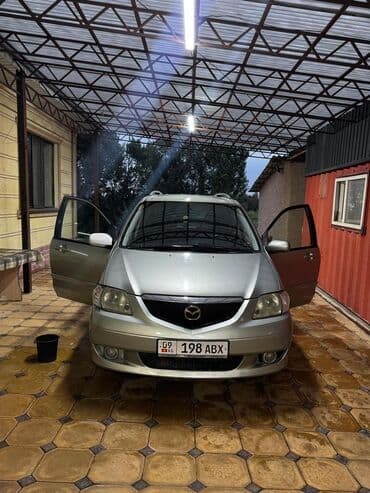 авто зарядное устройство для автомобильного аккумулятора: Mazda MPV: 2002 г., 2 л, Дизель, Минивэн — 1