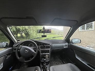 Унаа: Daewoo Nexia: 2009 г., 1.6 л, Кол менен иштөөчү, Бензин, Седан — 5