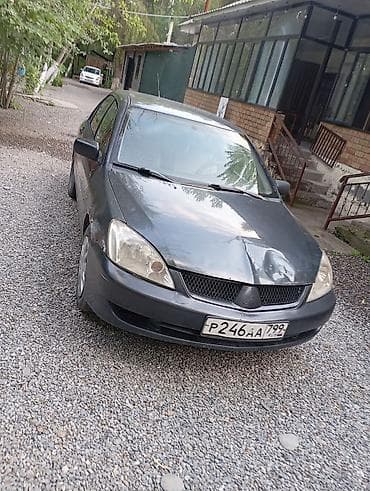 нокен: Mitsubishi Lancer: 2003 г., 1.8 л, Автомат, Бензин, Седан — 2