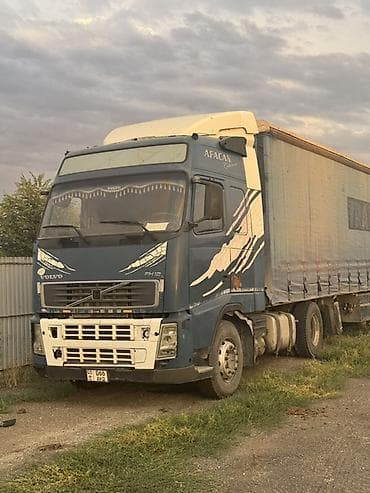 дом колёсах: Тягач, Volvo, Тентованный — 1