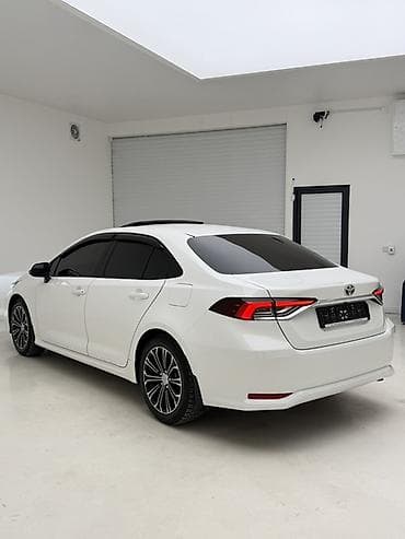 camry 1999: Toyota Corolla: 2024 г., 1.8 л, Автомат, Гибрид, Седан — 1