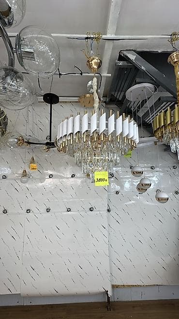 Подвесные люстры с хрустальными подвесками и металлическими элементами — 1