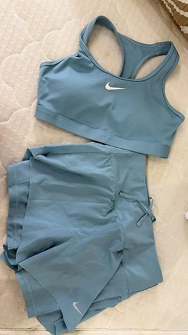шорты мужские спортивные: Беговые/тренировочные женские шорты и бра Nike, оригинал, цвет шорт — 1