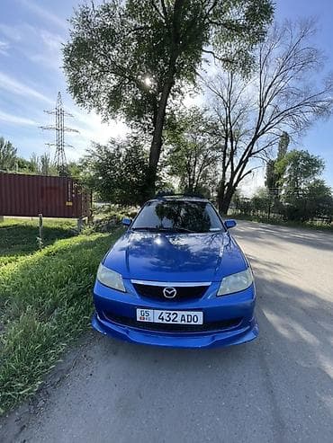 аренда mazda: Mazda 323: 2002 г., 1.6 л, Механика, Бензин, Хэтчбэк — 4