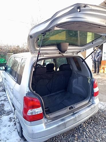 арзан машине: Mazda Demio: 2000 г., 1.5 л, Автомат, Бензин, Седан — 5