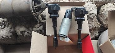 Детали двигателя и моторы в сборе: Катушка зажигания Mitsubishi Б/у, Оригинал, Япония — 1