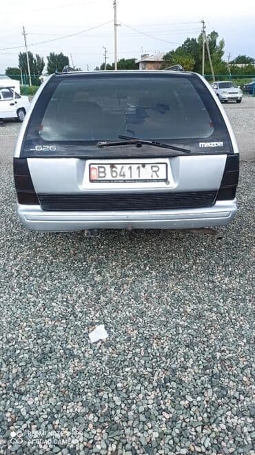 домик вагон: Mazda 626: 1991 г., 2 л, Механика, Бензиновая, Универсал — 4