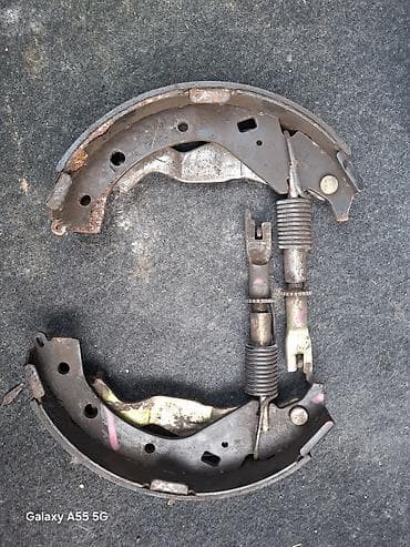 тормозной система: Комплект деталей стояночного тормоза (ручника) для задних барабанных — 2