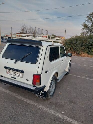 купить титановые диски на ниву: ВАЗ (ЛАДА) 4x4 Нива: 2003 г., 1.7 л, Механика, Бензиновая, Внедорожник — 7