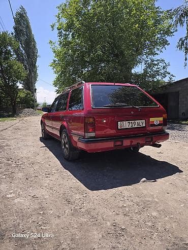 Datsun: Nissan Bluebird: 1988 г., 2 л, Механика, Бензин, Универсал — 3