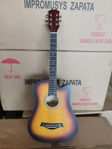 Гитары 38 размер акустика, новые с упаковки at lalafo.kg Гитары 38 размер акустика, новые с упаковки