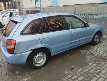автомобиль бу: Mazda 323: 2002 г., 1.6 л, Механика, Бензин, Хэтчбэк — 4
