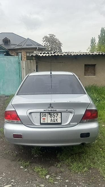 выхлоп бмв е34: Mitsubishi Lancer: 2005 г., Ручные, Бензин, Седан — 7