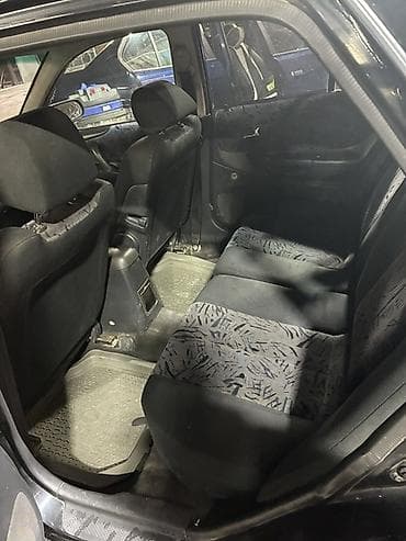 prius 30: Mazda 323: 2000 г., 1.6 л, Ручные, Бензин, Хэтчбэк — 7