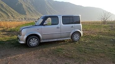byd e7: Nissan Cube: 2002 г., Автомат, Бензин, Минивэн — 3