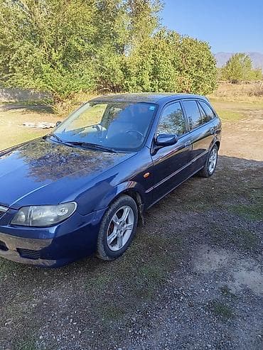 Mazda 323: 2003 г., 1.6 л, Механика, Бензин, Хэтчбэк