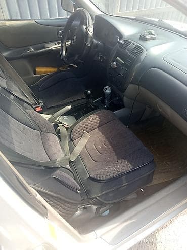 dot 4: Mazda 323: 2002 г., 1.6 л, Механика, Бензин, Универсал — 1