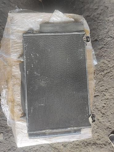 ist: Toyota IST, радиатор кондиционера — 1