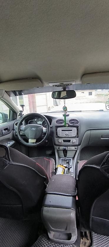 сут машине: Ford Focus: 2008 г., 1.6 л, Автомат, Бензин, Седан — 2