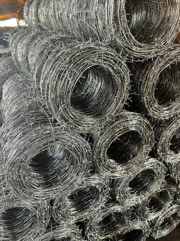 Колючая проволока двухжильная в рулонах, предназначенная для создания