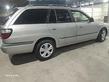 p 12: Mazda Capella: 1999 г., 0.2 л, Механика, Бензин, Универсал — 2