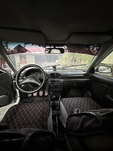 руль sonata: Легковой автомобиль хэтчбек, белый цвет, 4 двери. Особенности и — 7