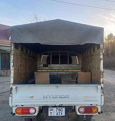 b class: Hyundai Porter II тентованный бортовой малотоннажник. - Двигатель — 4